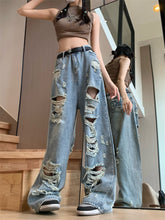 Zerrissene Jeans mit ausgefranstem Detail und hoher Taille